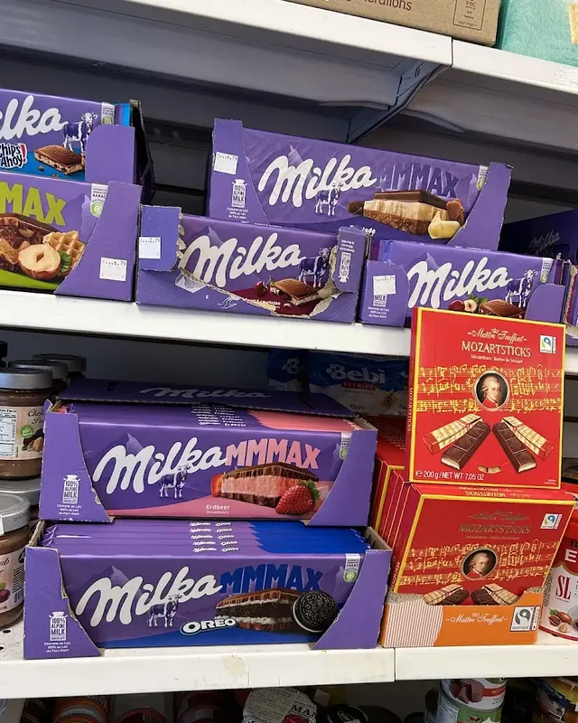 Milka and Kinder chocolates on the shelf